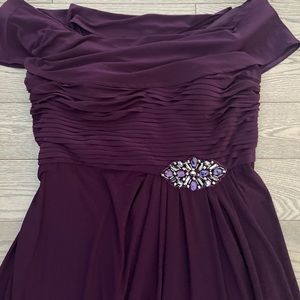 Long plum David’s bridal dress with slit